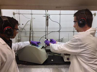 Monojit Bag (left) and graduate student Tim Gehan (right) synthesize polymer nanoparticles