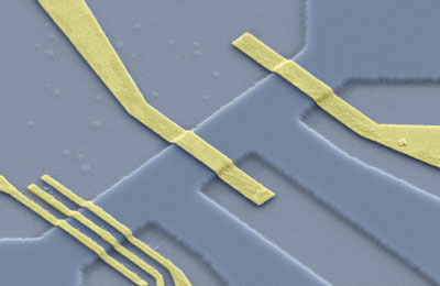 Etched semiconducting channel with electron source (A) and barrier (B)