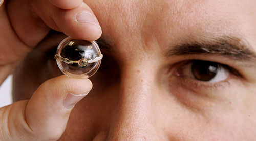 Michael McAlpine holding a contact lens
