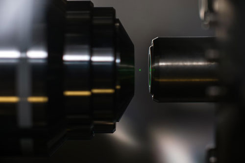 A Glowing, Optically Levitated Nanodiamond