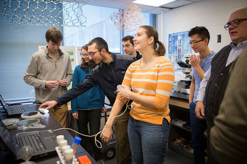 Lynn Rathbun, laboratory manager at the Cornell NanoScale Science and Technology Facility, shows engineering students how to set up demonstrations