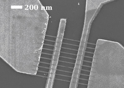 This scanning electron microscope image shows graphene nanoribbons that are 22 nanometers wide between the middle electrode pair