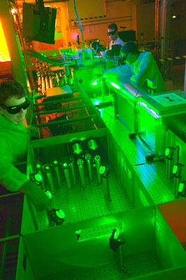 >Berkeley Lab’s Csaba Toth, Joseph Wallig, and Wim Leemans working with a 40-terawatt laser