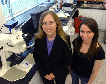 Carol Livermore, associate professor of mechanical engineering, left, stands with graduate student Frances Hill in Livermore's lab