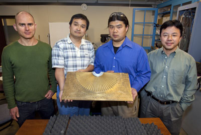 Berkeley researchers (from left) Guy Bartal, Xiaobo Yin, Lee Fok and Xiang Zhang shown with their acoustic hyperlens which boosts the magnification of sound-based imaging technologies such as ultrasound and underwater sonar by eightfold