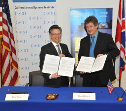 CNSI director Paul Weiss (left) and NSQI director Daniel Robert at the UCLA signing ceremony
