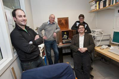 Joshua Rosenberg, manager of the University's microscopy imaging facility, Professor of Physics Krzysztof Kempa, Greg McMahon, a researcher and nanolithography specialist in the University's Clean Room Nanofabrication Facility, and Ferris Professor of Physics Michael J. Naughton