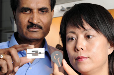Krishna Naishadham, left, and Xiaojuan (Judy) Song display two types of wireless ammonia-sensing prototype devices