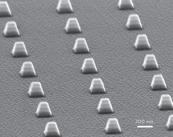 Electron micrograph showing arrays of indefinite optical cavities comprised of silver/germanium multilayers