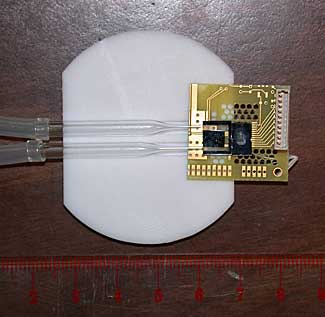 Prototype microchip device combining a atomic magnetometer with a fluid channel