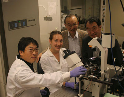 From L to R, Brian Seunghan Oh, a materials science postdoc in the Jacobs School's Department of Mechanical & Aerospace Engineering; Karla Brammer, a Jacobs School materials science graduate student; Jacobs School bioengineering professor Shu Chien; and materials science professor Sungho Jin.