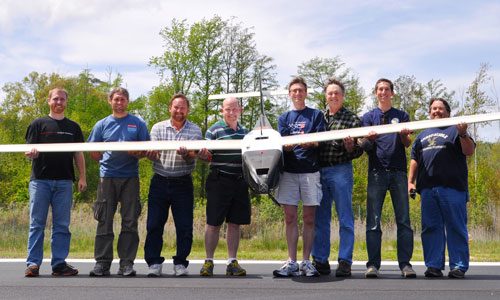 The NRL flight crew holds the Ion Tiger unmanned aerial vehicle