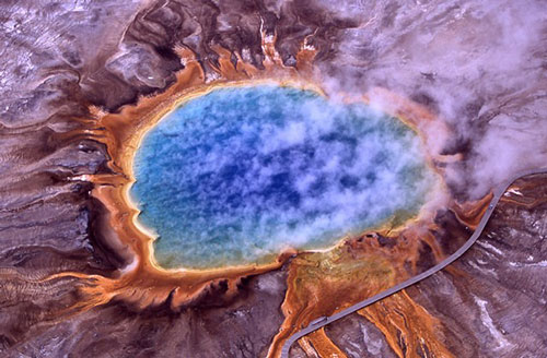 orange-colored microbial colony surrounding Grand Prismatic Spring at Yellowstone National Park
