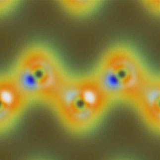 Simulated valence-charge density from x-ray and optical wave mixing shows the nuclei of carbon atoms as dark spots