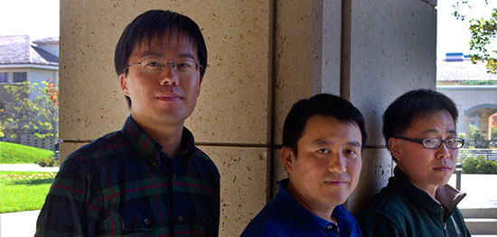 Professor Shanhui Fan (center), post-doctoral scholar Zongfu Yu (right), both of the Stanford School of Engineering, and doctoral candidate Kejie Fang (left)