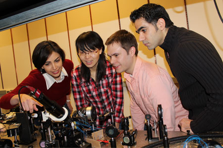>Mona Jarrahi, assistant professor of electrical engineering and computer science, and members of her research team