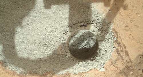 Mars rover Curiosity used its drill to generate this ring of powdered roc
