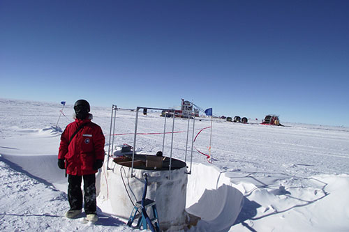 Bakhtiyar Ruzybayev is shown working on an IceTop cosmic ray detector