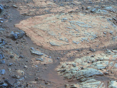 ancient mudstones on a rocky outcrop on the rim of Endeavour Crater on Mars