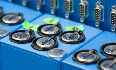 an apparatus used to charge lithium ion coin cell batteries