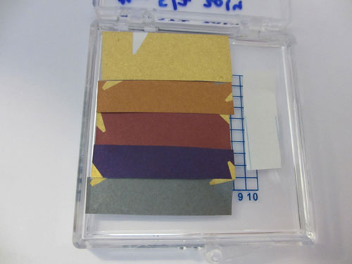 Gold-coated notebook paper pieces with ultra-thin germanium films of different thickness deposited on top