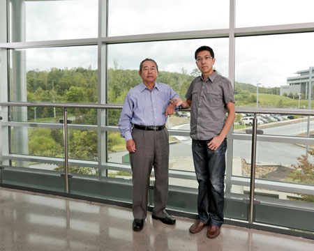 Takeshi Egami, left, and Wigner Fellow Yue Fan