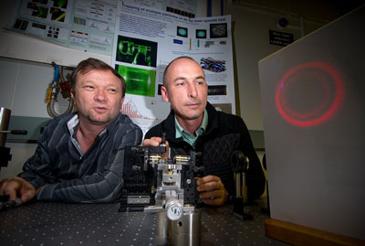 Dr Vladlen Shvedov (L) and Dr Cyril Hnatovsky adjusting the hollow laser beam in their lab