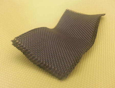 Tungsten-coated Kevlar with a Kevlar (uncoated) background