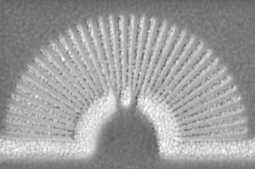 The image shows a metamaterial hyperlens