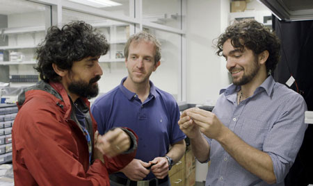 Stanford Assistant Professor Manu Prakash, left, and graduate students Jim Cybulski and Georgios Katsikis