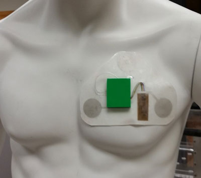 Textile patch with ABS plastic shell containing circuitry for measuring ECG, PPG, wheezing, and motion
