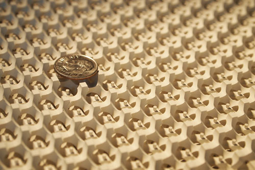 gyroid surface with a dime on top
