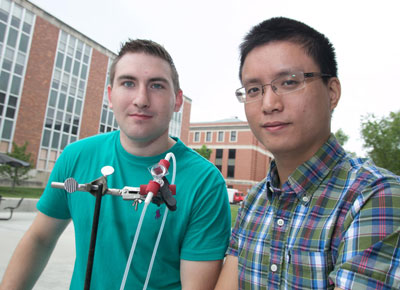 Doctoral students Billy McCulloch (left) and Mingzhe Yu (right) of The Ohio State University