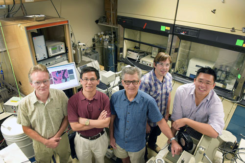 Sandia National Laboratories researchers, from right, Stan Chou, Bryan Kaehr, Jeff Brinker, Ping Lu and Eric Coker
