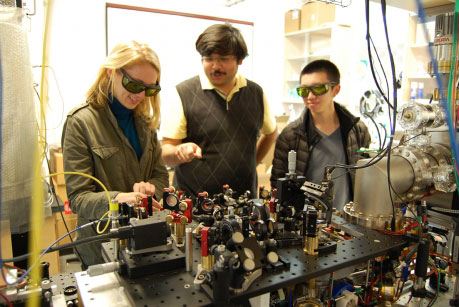 Graduate students Airlia Shaffer, Yogesh Patil and Harry Cheung work in the Ultracold Lab of Mukund Vengalattore, assistant professor of physics.