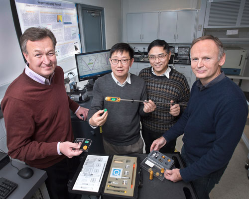 Nuclear theorist Dmitri Kharzeev with scientists Qiang Li, Genda Gu, and Tonica Valla