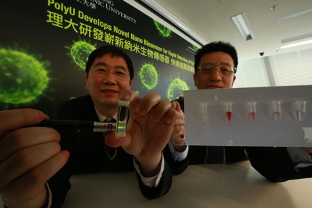 Dr Jianhua Hao, Associate Professor of Department of Applied Physics (right) and Dr Mo Yang, Associate Professor of Interdisciplinary Division of Biomedical Engineering