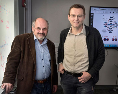 Brookhaven Lab theoretical physicist Alexei Tsvelik (left) and physicist Igor Zaliznyak