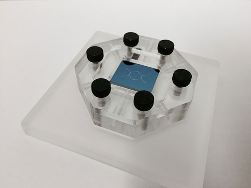 nanoDLD chip mounted in a microfluidic jig