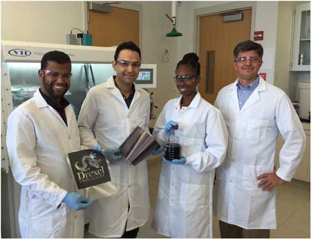 Mohamed Alhabeb, Dr. Babak Anasori, Christine Hatter and Prof. Yury Gogotsi (from left to right) in Professor Gogotsi’s lab at Drexel University hold samples of MXene films and paint that are used for electromagnetic shielding