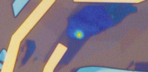 Microscope image of a quantum LED device showing bright quantum emitter generating a stream of single photons