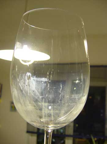 An example of a glass showing cracking and opacity due to corrosion