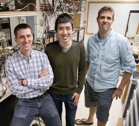 (l to r) Graduate students Eric Meier and Fangzhao Alex An are with Bryce Gadway in Loomis Laboratory at Illinois