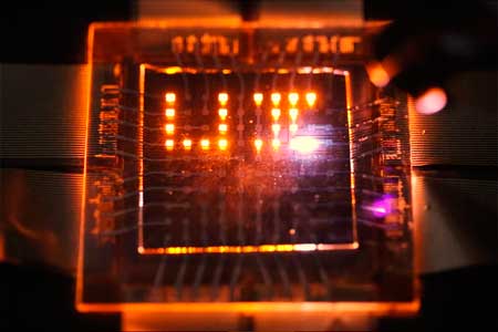 A laser stylus writes on a small array of multifunction pixels made by dual-function LEDs than can both emit and respond to light
