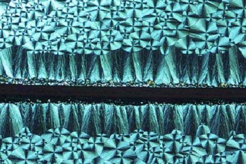 Crystallization behavior can be controlled locally, creating regions with different crystal patterns