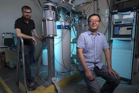 UCI Physicist Jing Xia and Graduate Student Alex Stern