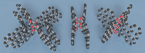 visualization of the different types of diamond-like linkages (red spheres) formed at curved surfaces or between the layers of graphene (black spheres) in compressed glassy carbon