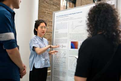 Yan Yang presents her poster