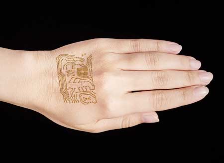 Nanomesh conductor applied to back of hand