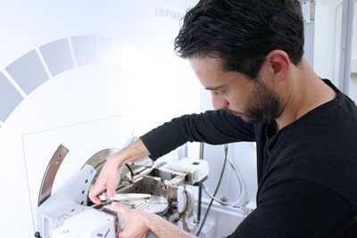 Anastasios Pateras adjust an X-Ray instrument